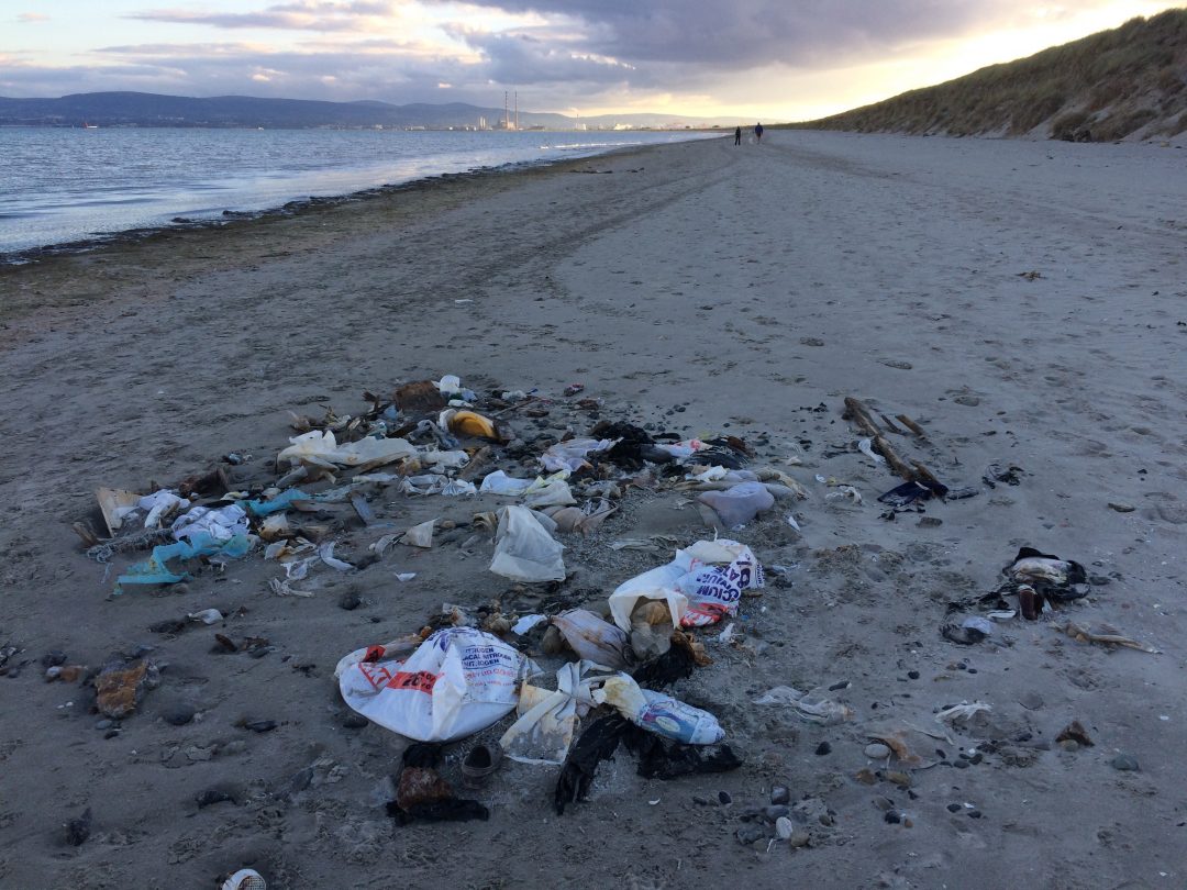Plastic Bags litter beach Ireland.